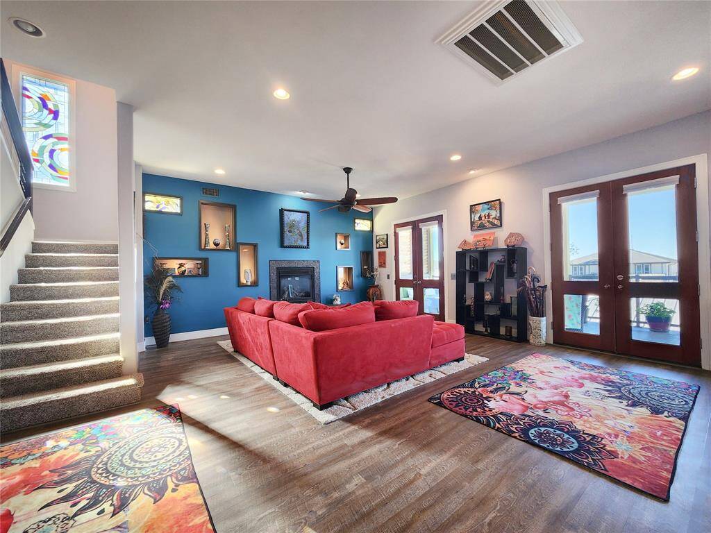 Another view of the living area with a wall of niches.