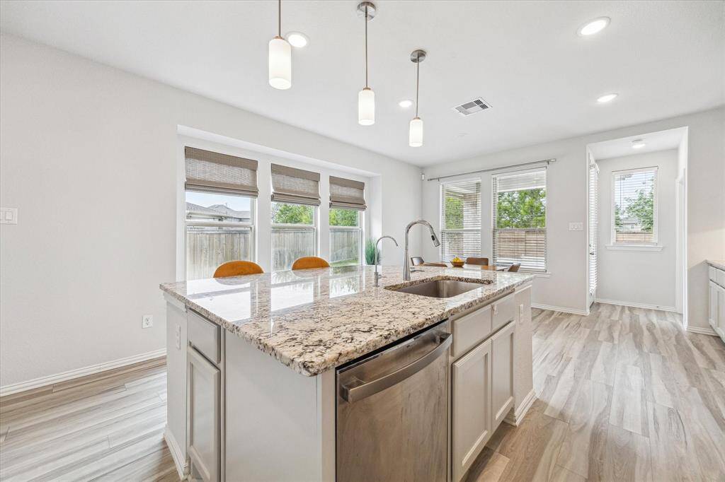 The large functional chef's kitchen with Kentmore Cabinets will inspire cooking and entertaining