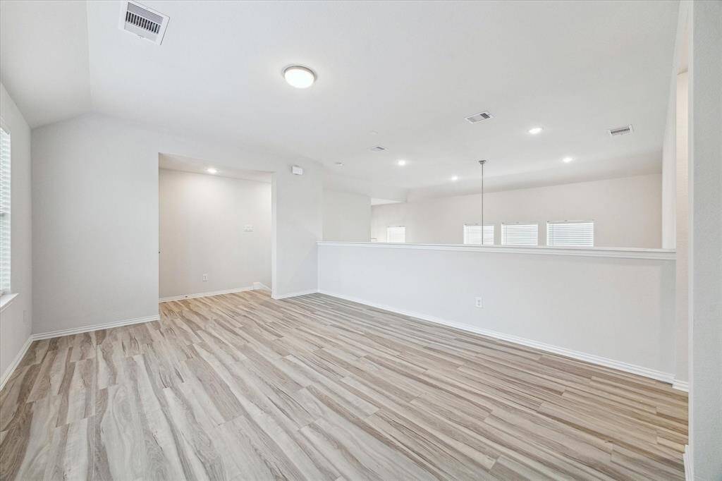 Upstairs you will find  a spacious game room for the whole family to enjoy