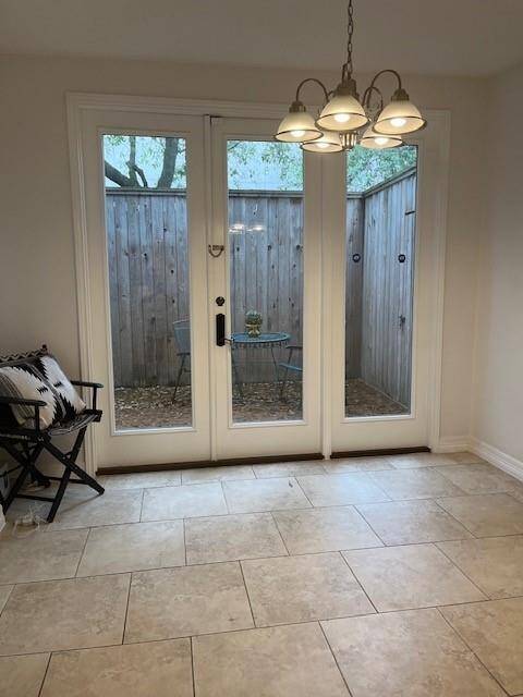 Dining area that opens up to a large wooded deck