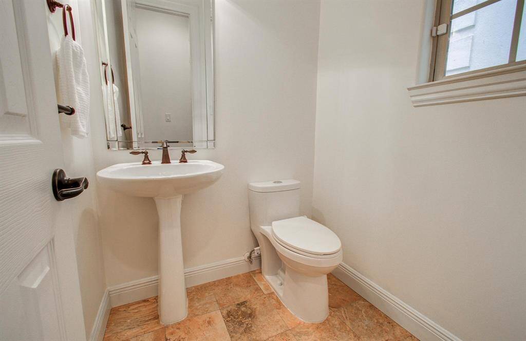 Powder room conveniently located on the second floor.