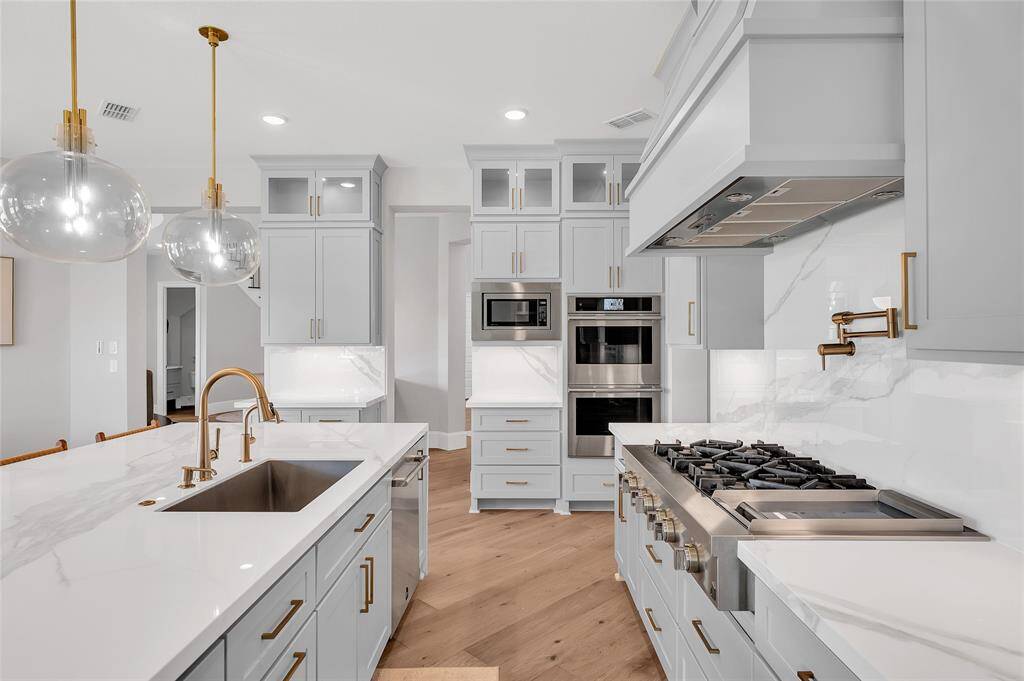 Top-of-the-line  stainless steel appliances.