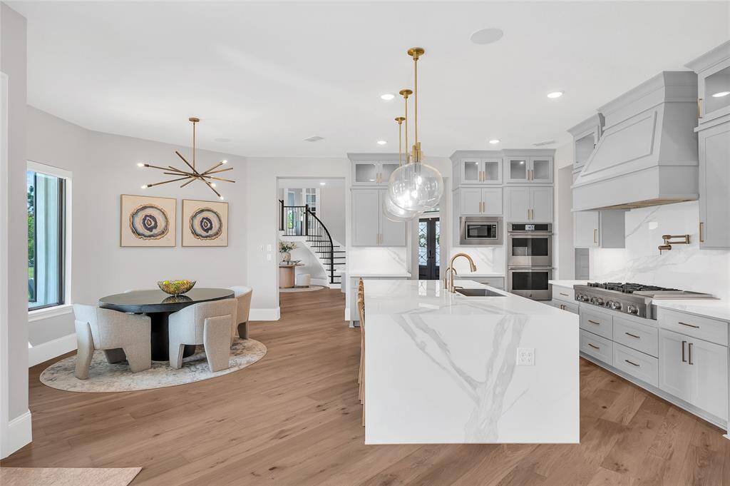 Breakfast nook with modern chandelier.