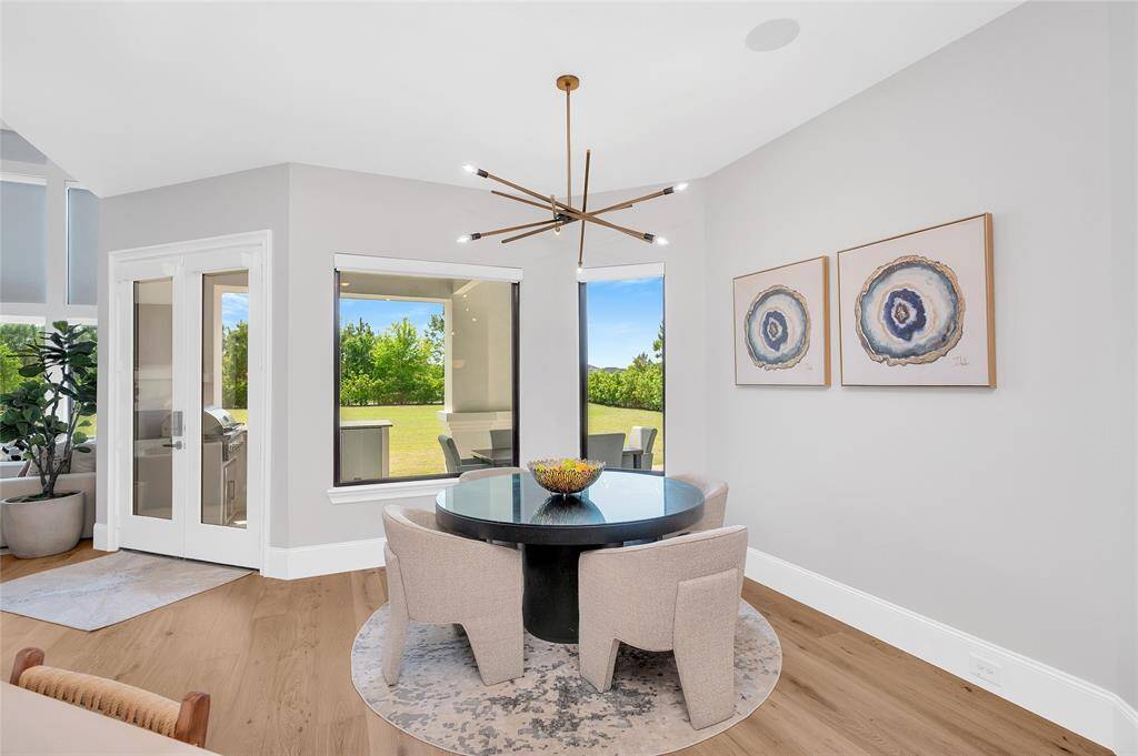 Double doors from the breakfast nook to the covered patio.