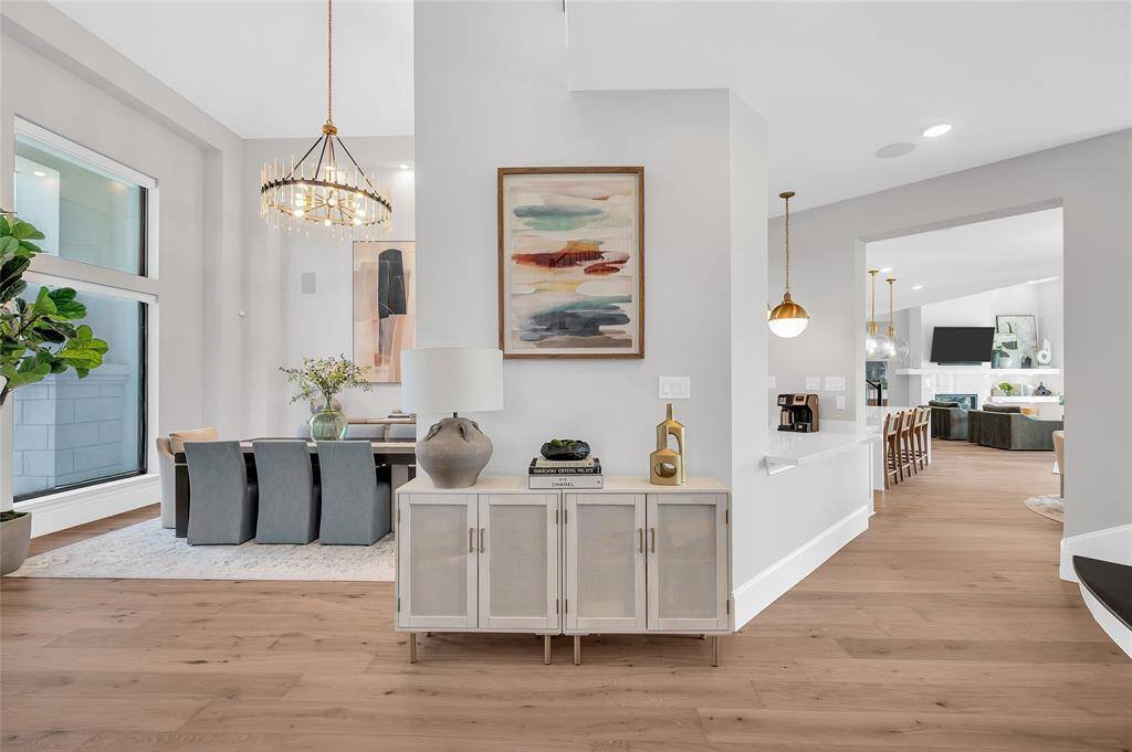 Recently upgraded wood flooring flows throughout the main areas of the first and second level and the primary bedroom. Home also features a central vacuum system.