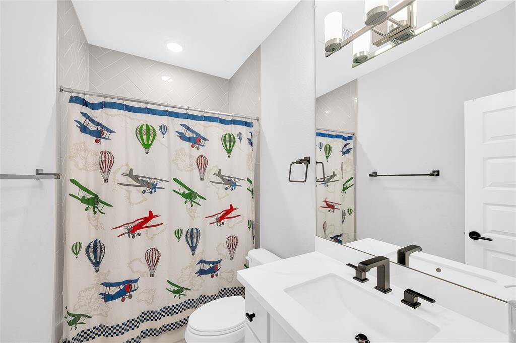 Access to the second level full bathroom from the hallway and 3rd bedroom.