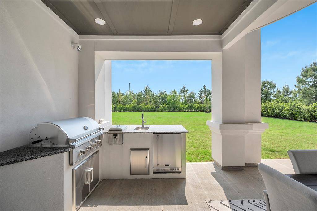 Secluded backyard with space to create a luxurious, oversized pool and outdoor retreat