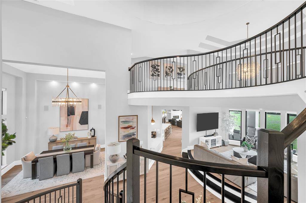 Stunning view from the mid-level study into the formal dining room, elevated living room, and family room.