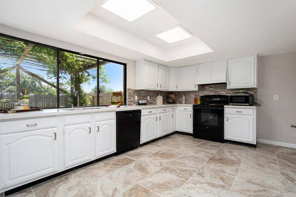 Large Serving Window Opens to Patio Area