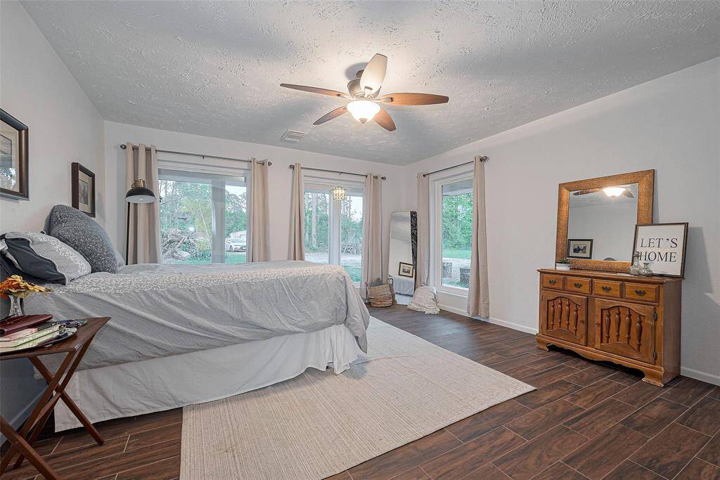 Primary Bedroom, first floor, tons of natural light