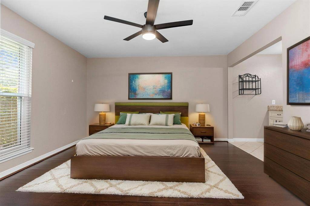 This owner suite has its own private spa bathroom.  Virtual stage.