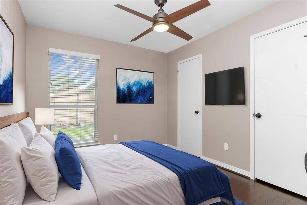 All guest bedrooms have high ceilings and ceiling fans!  Virtual staged.