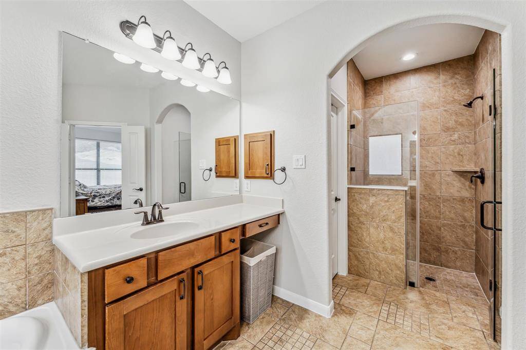 Additional view of the luxurious primary bathroom