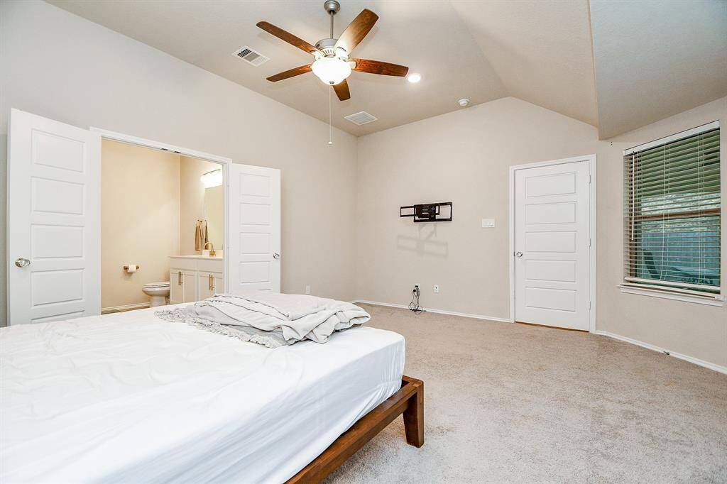 The neutral color palette creates a calming atmosphere, while the generous space provides flexibility for both lounging and personalizing with your favorite furnishings. A beautifully designed en-suite bathroom and a walk-in closet complete the suite, offering both luxury and practicality. This room is a great sanctuary to unwind and enjoy peaceful moments.