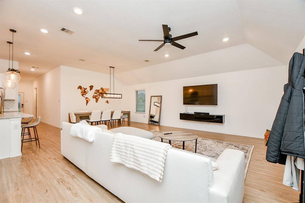 A cozy focal point. Whether you’re entertaining guests or unwinding after a long day, this living room provides a comfortable and stylish space to enjoy.