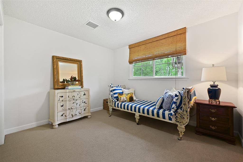 Secondary bedroom number two is also spacious and features a walk-in closet.