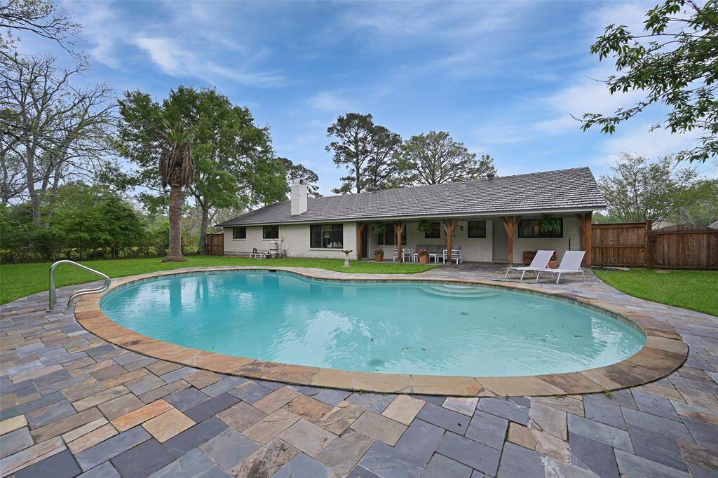 Slate tile surround your custom pool. The pool has been recently re-plastered and all new pool equipment was installed.
