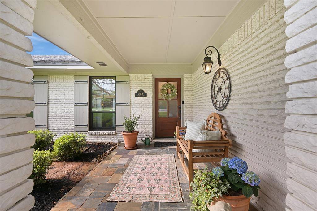 Sophistication abounds, with all new Pella windows and manicured flowerbeds, adding the ultimate in curb appeal.