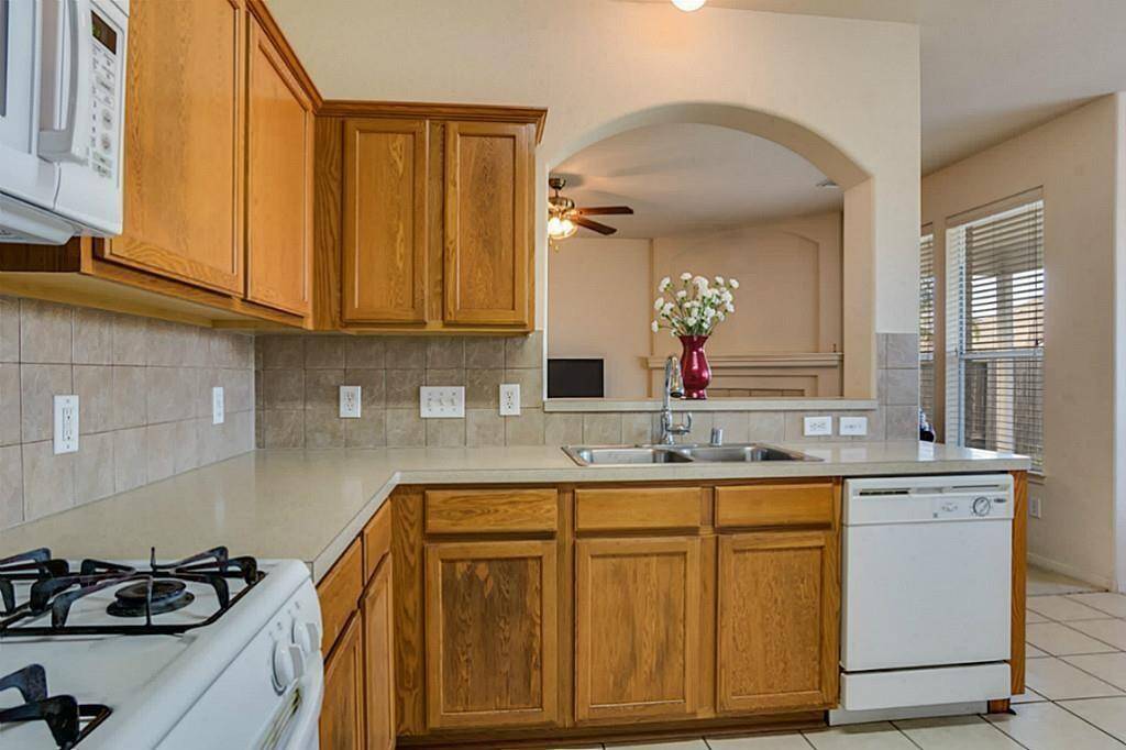 Another view of the kitchen that ready for a warm home cook meal
