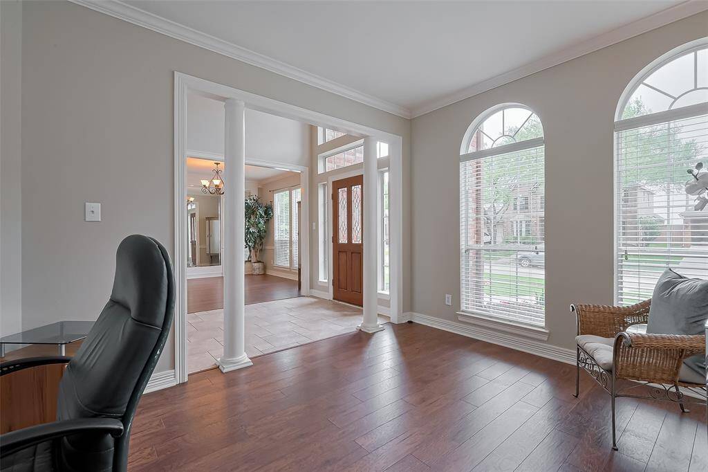 Office or Den area has rounded windows and pillars for separation