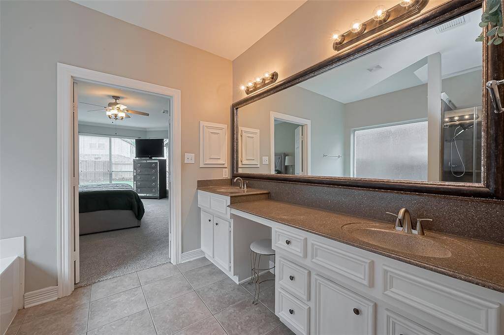 Primary ensuite with double sink and vanity