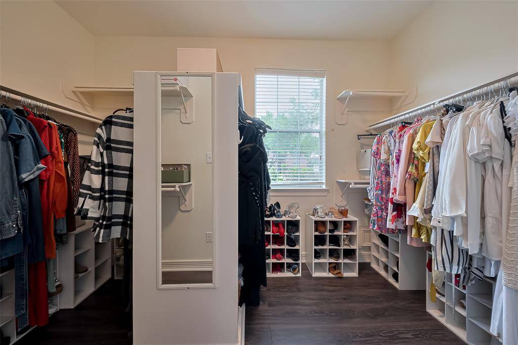 Primary closet has loads of space and a window!