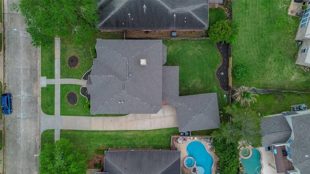 New roof 2025 on house and garage and covered patio!