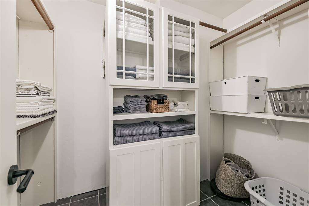 The primary bath has additional storage space.