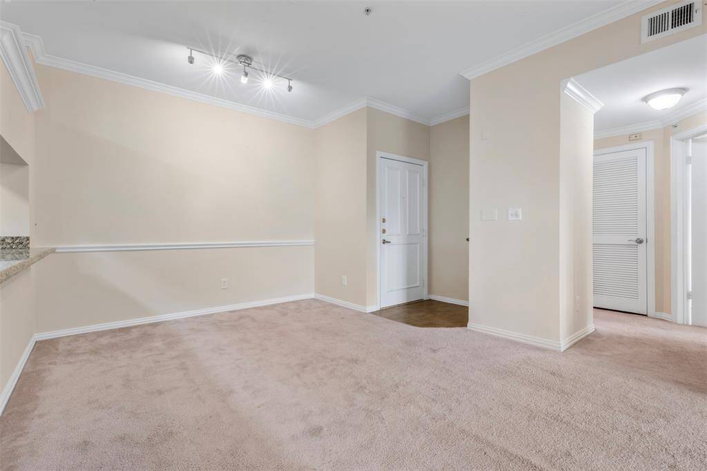 Dining room view with entrance door