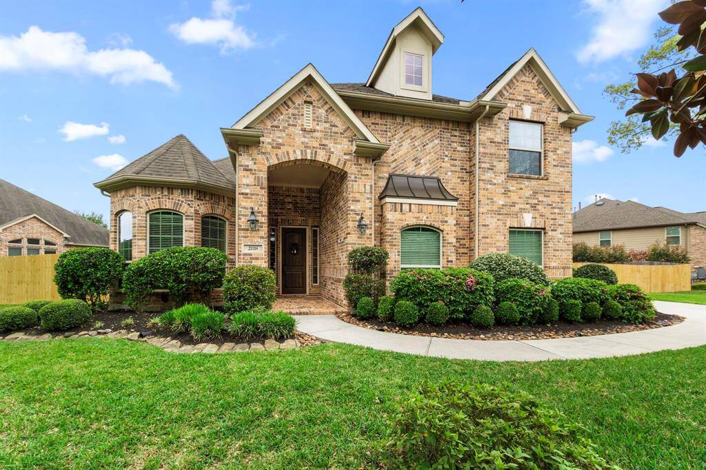 Exterior brick home on all 4 sides, with 3 car garage and ample space for a future pool