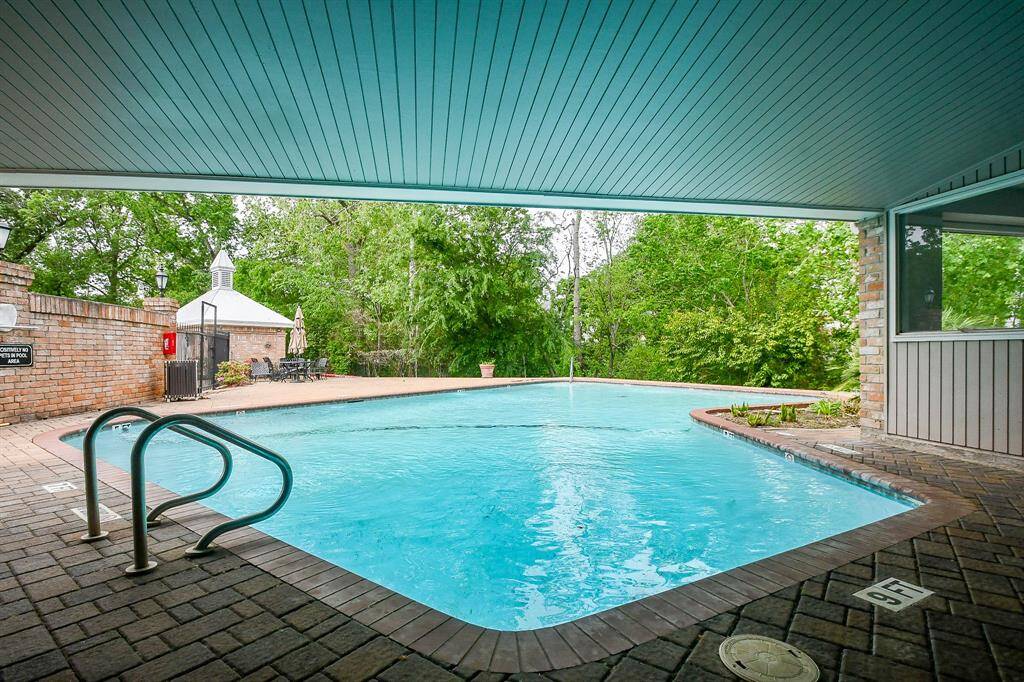 The pool is open on one end for sun bathing and covered on the other end to provide shade.