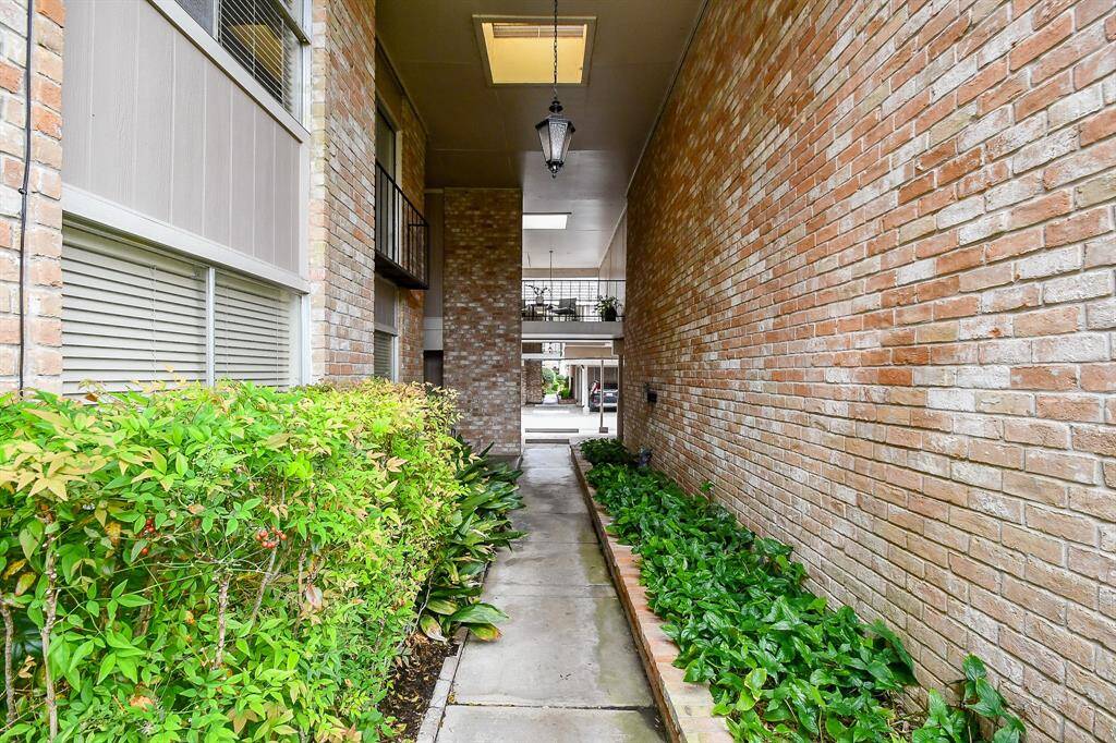 This sidewalk leads to the unit which is located on the second floor.