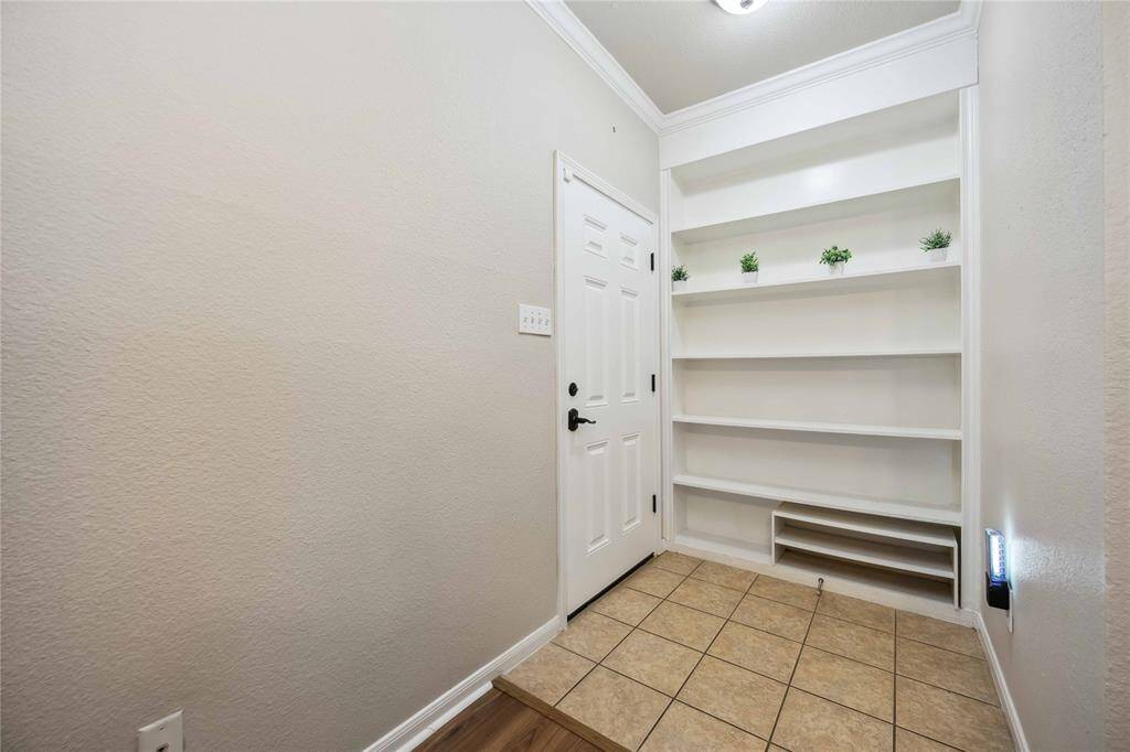 Built-in shelves in entryway