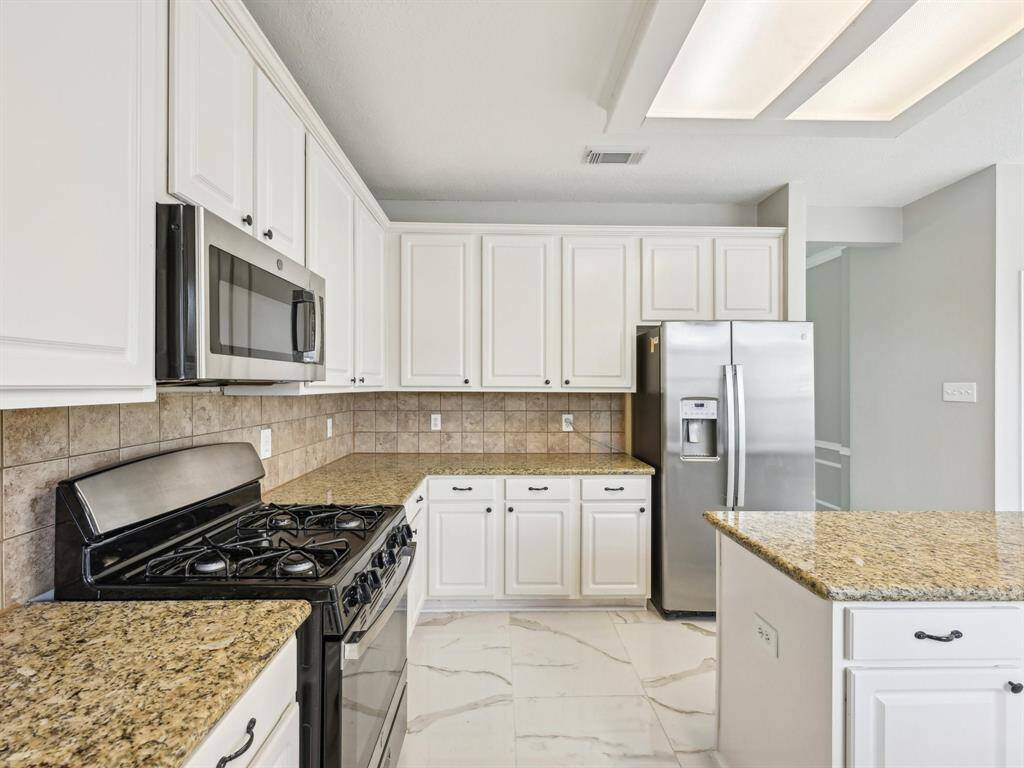 This terrific home even comes with a refrigerator for the lucky new owner!