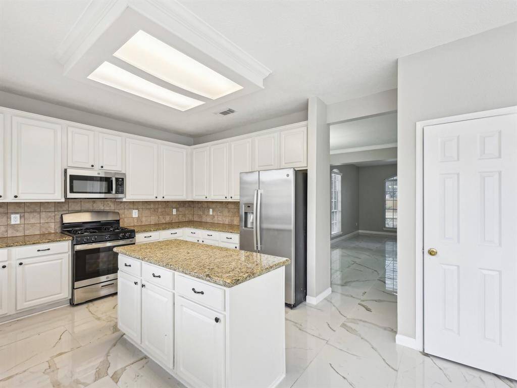 The pantry is the door on the right.