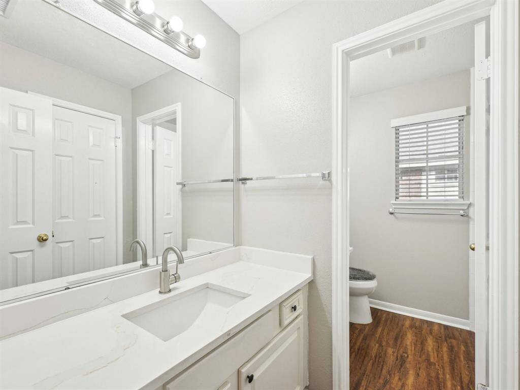 The Secondary Bathroom has not one, but two sinks, so there is no need to share!