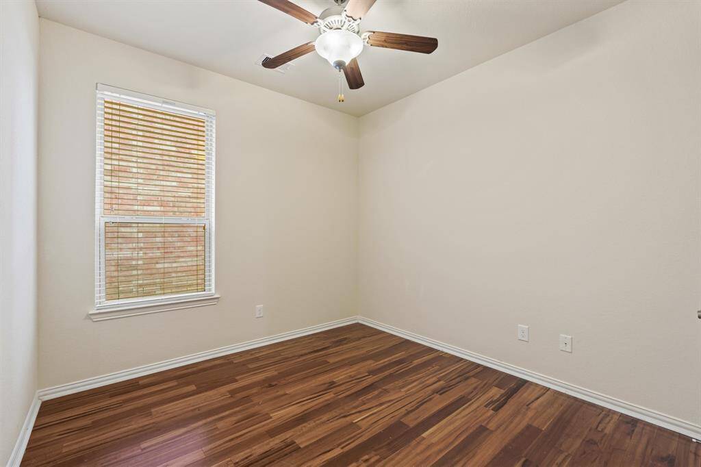 This Lennar floor plan offers four roomy bedrooms and two full bathrooms. All of the guest bedrooms have hardwood flooring, neutral paint, cooling fans, large closets and easy access to a full bathroom.