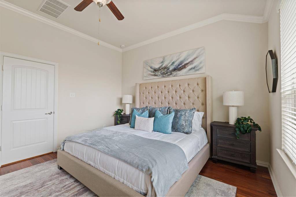 With rich hardwood flooring, soft neutral tones, and plenty of room for a California King and additional large furnishings, this retreat offers comfort, style, and space to truly unwind.
