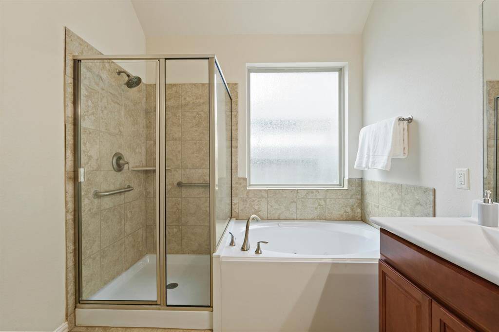 Relax and soak your worries away in this luxurious jetted tub or enjoy a quick rinse in the oversized walk-in shower. Either way, we promise, you'll love this private retreat.
