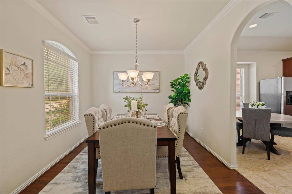 Gather them around your table to honor old traditions and create the new, this elegant formal dining room offers the perfect setting to celebrate any occasion.