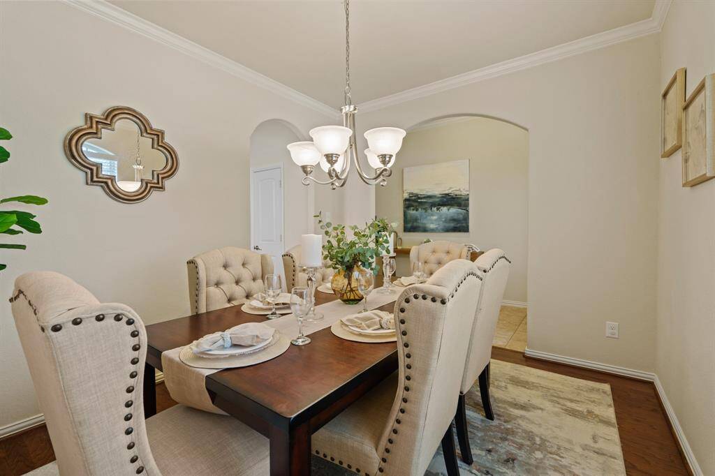 This lovely dining room offers ample space for your banquet table and sideboard, with easy access to the kitchen for effortless entertaining.