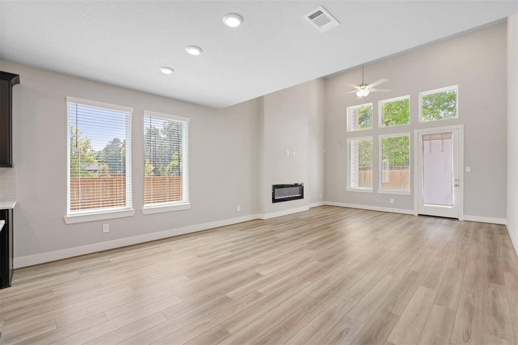 Open concept loving space with high ceilings and a lot of natural light