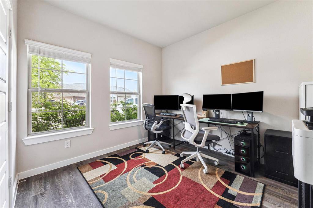 First floor bedroom is being used as a home office
