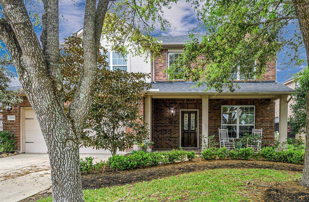 Welcome home to this spectacular Ashton Woods home located in Cross Creek Ranch featuring 5 bedrooms, 3.5 baths & 2 car garage! Full brick exterior and full manicured live oak trees in front!