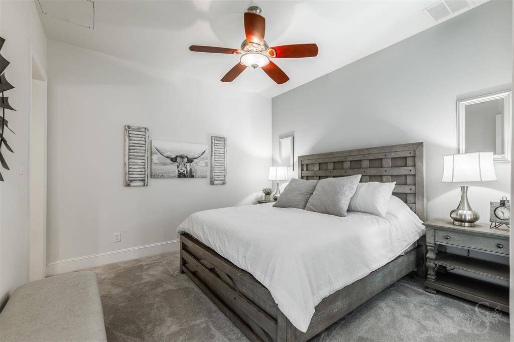 This secondary bedroom on the FIRST floor has plenty of room for a large bed and other furnishings. Featuring  NEW carpet and en-suite full bath. This would make a perfect in-law suite or guest bedroom!