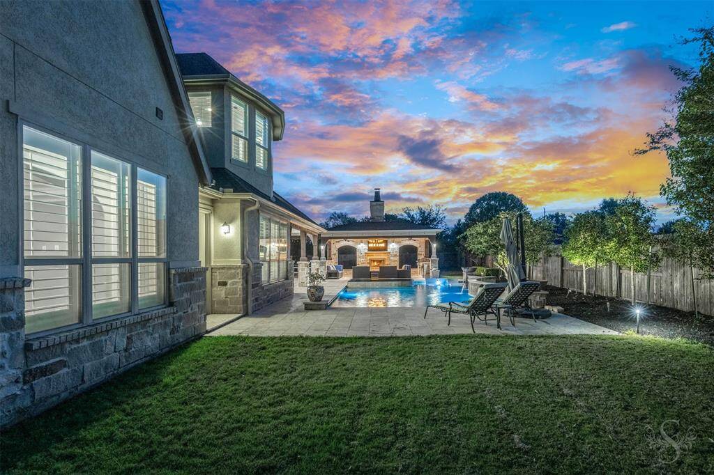 Set on a 1/3-acre lot, this home and expansive backyard is designed for both entertaining and everyday living. It features two covered patios - one with a stone fireplace and outdoor kitchen, the other with ample space for dining and lounging. A sparkling pool and spa anchor the space, surrounded by landscaping and a large grassy area that adds to both beauty and functionality. A few upgrades are an extended sprinkler system and a new pool heater.