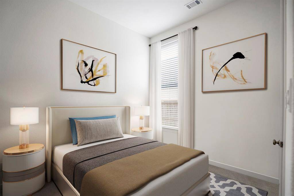 The final secondary bedroom featuring neutral paint, bright natural light, and a spacious closet. *This room has been virtually staged