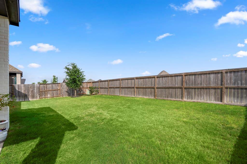 Imagine the space you can create in the spacious backyard!
