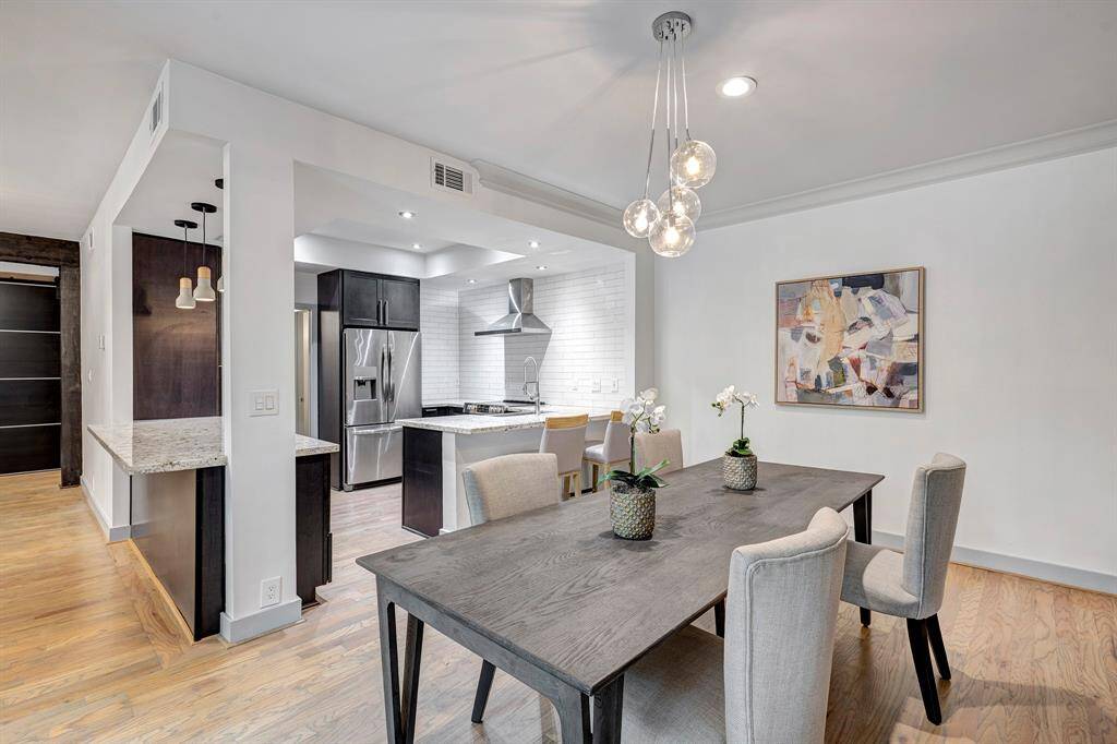 Dining room is large and can accomodate a large table for entertaining.