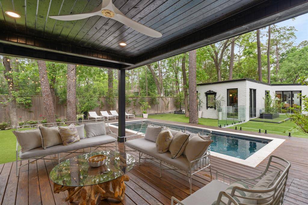 A view from the covered patio looking towards the pool. Perfect spot to cool off during those hot summer days. This backyard keeps unveiling itself with more and more surprises with every inch of it being usable entertaining spaces and we’ve only seen half of it so far!
